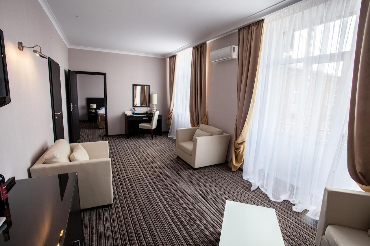 Hotel Optima Sumy Pokoj fotografie